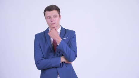슈트 입은 잘생긴 젊은 사업가