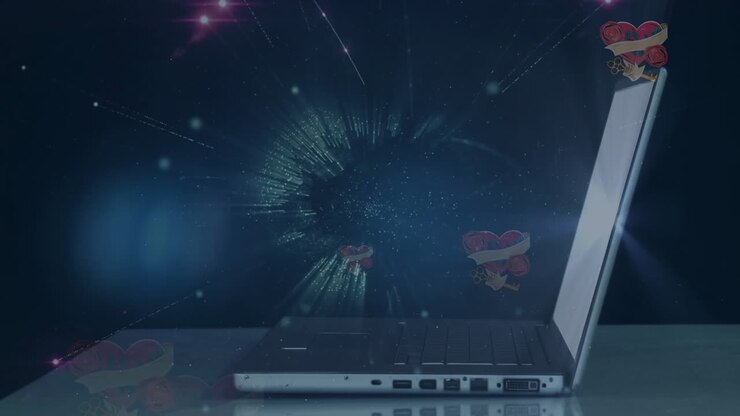 Animation of globe with hearts and fireworks over laptop