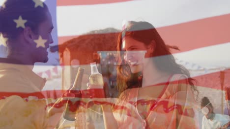 Animation-of-diverse-friends-at-beach-party-over-flag-of-usa