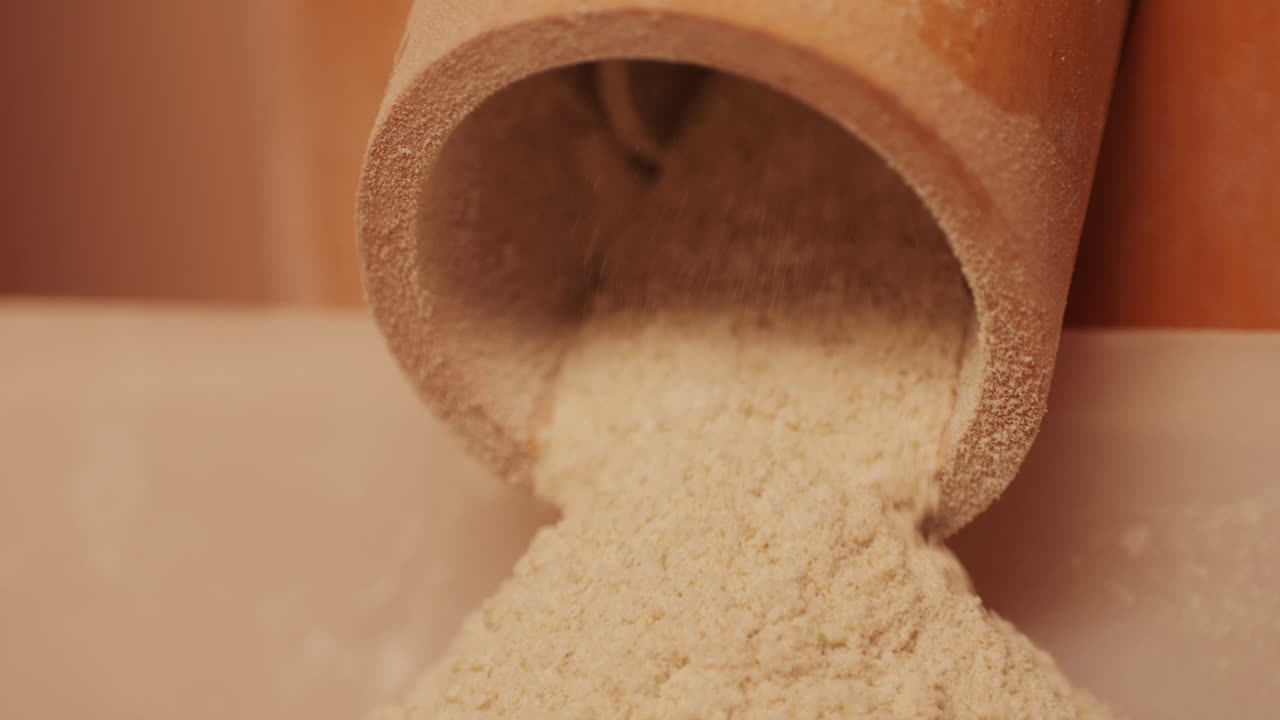 Machinery making flour in wheat flour in bakery or factory, electrical mill machinery. Wheat against diseases and insects using modern equipment. Clip. Concept of food industry. Small business concept . High quality 4k footage