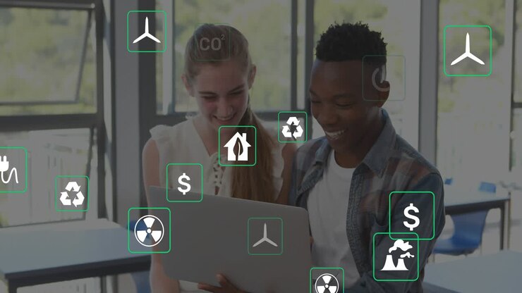 Two students sharing laptop, icons appearing then drifting and overlapping laptop, studying energy