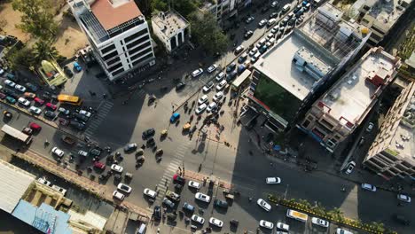 aerial drone shot highlighting the fast-growing urban sprawl of hyderabad, where new constructions blend with older city structures.