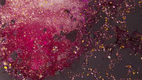 abstract pink and gold liquid paint texture