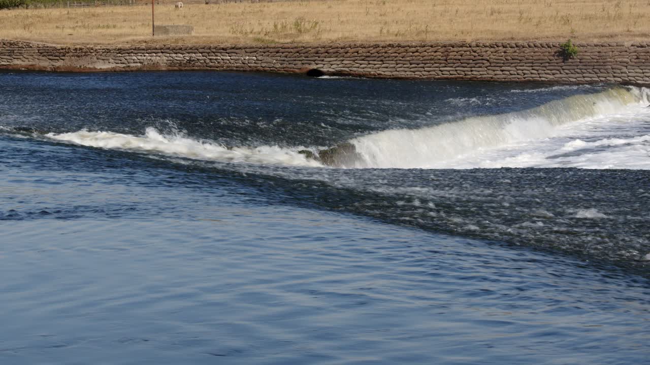 Showing the V-notch at the River Trent weir by By Ratcliffe on Soar Power station. Wide shot