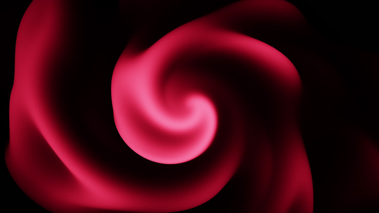 A captivating image featuring a swirling motion of predominantly red and black hues. The dynamic swirl seems to be rotating clockwise, creating a mesmerizing visual effect
