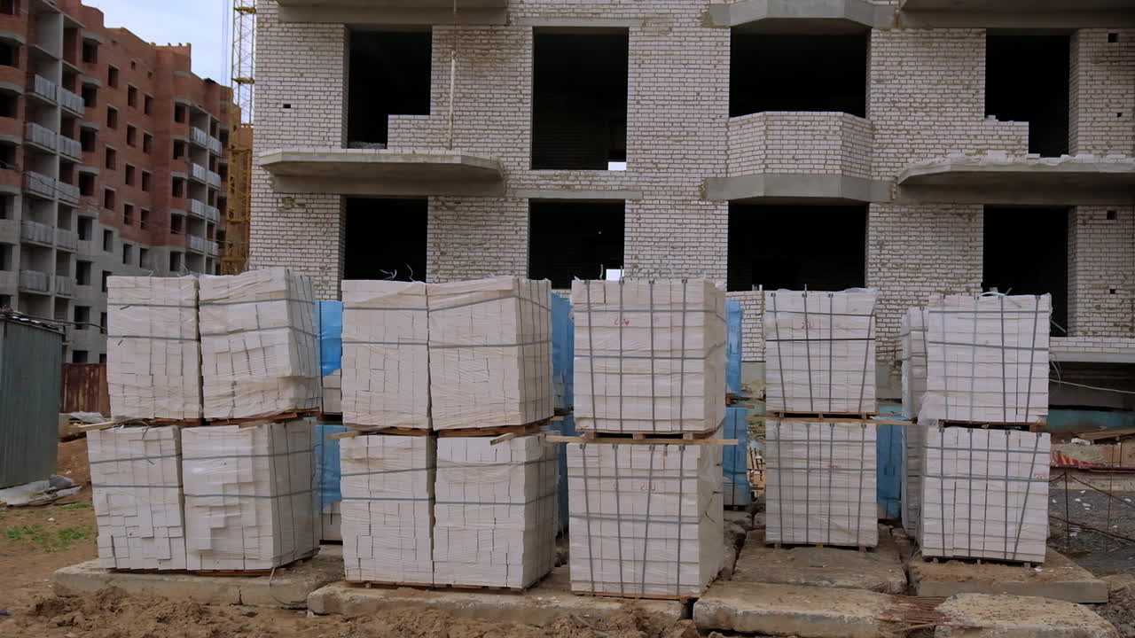 Construction site with stacked bricks