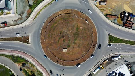 bird's eye view of traffic circle in city industrial area