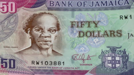jamaican 50 dollar banknote with samuel sharpe portrait on green screen