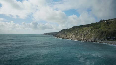 4K-Panoramic-landscape-shot-of-the-cliffs-of-Church-Ope-on-the-island-of-Portland,-in-Dorset,-England,-on-a-beautiful-sunny-day