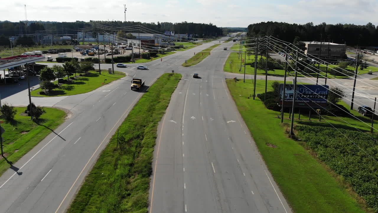 Aerial View of a Highway Intersection with Cars