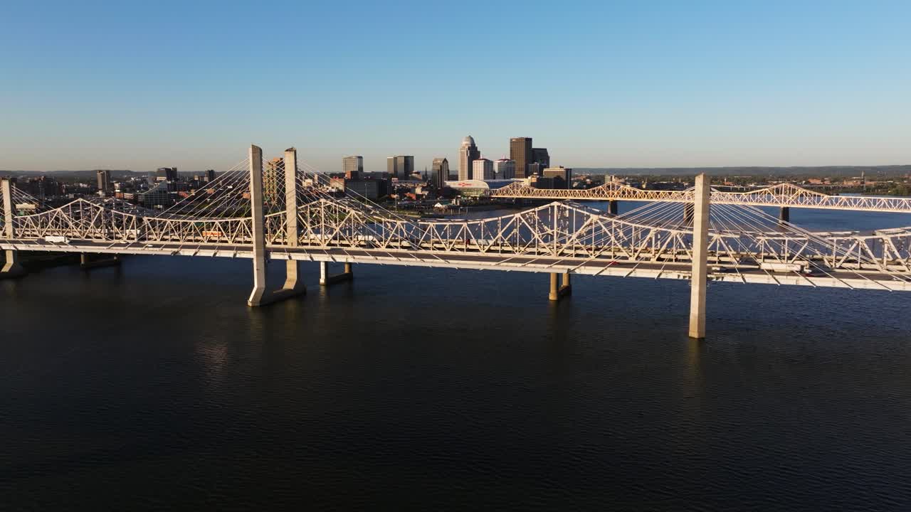 Beautiful Drone Shot Above Big Four Bridge, Ohio River. Louisville Skyline in Background
