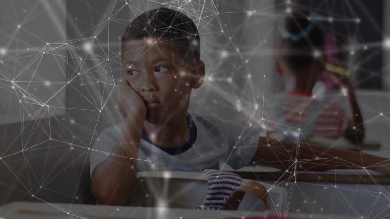 Bored boy leaning and gazing in classroom, classmate writing in notebook, network overlay drifting