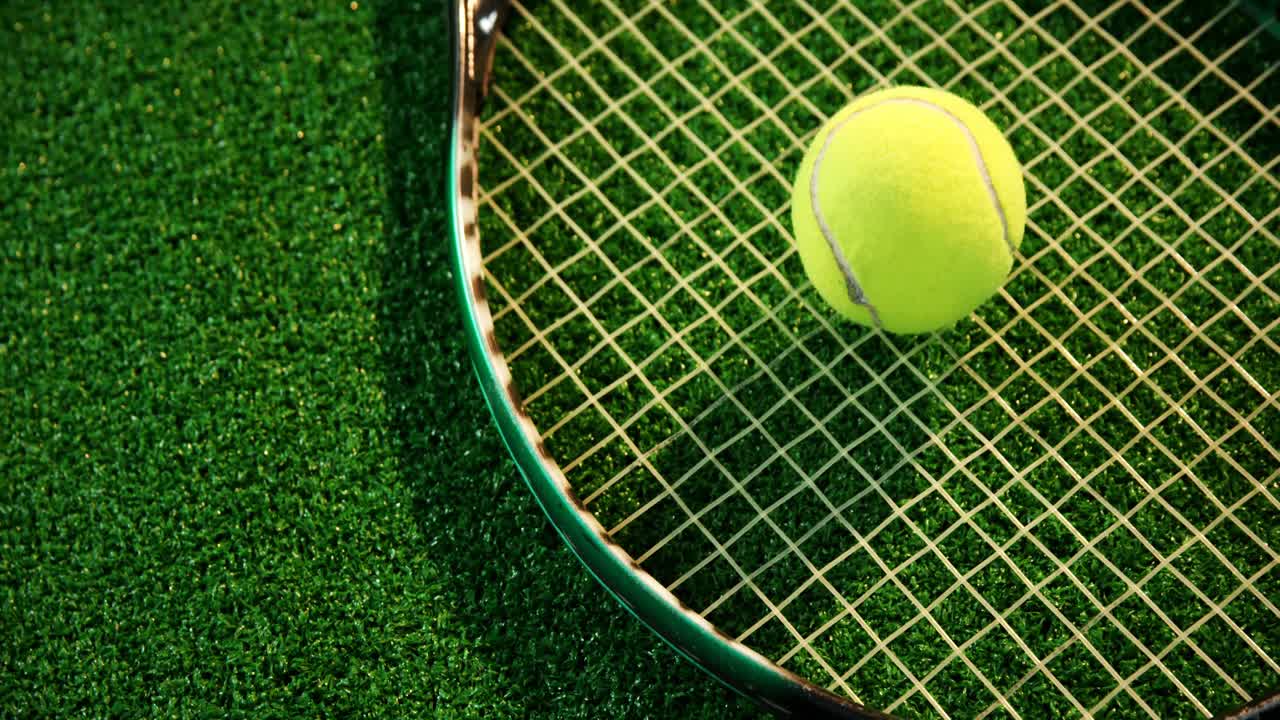 Close-up of tennis ball on racket 4k