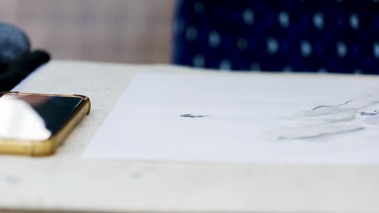 Footage of a Japanese Man Painting a Nihonga, a Traditional Japanese Painting, with Brushes and Black Ink