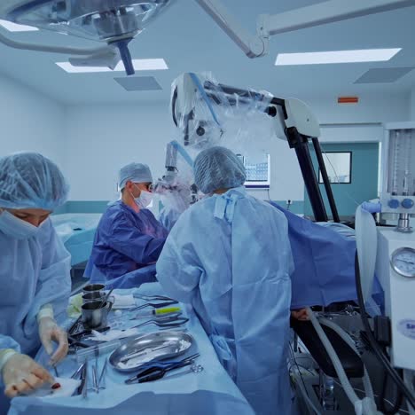 surgeons at work in operating room