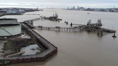 drone view tranmere oil terminal birkenhead coastal petrochemical harbour distribution descending pan left