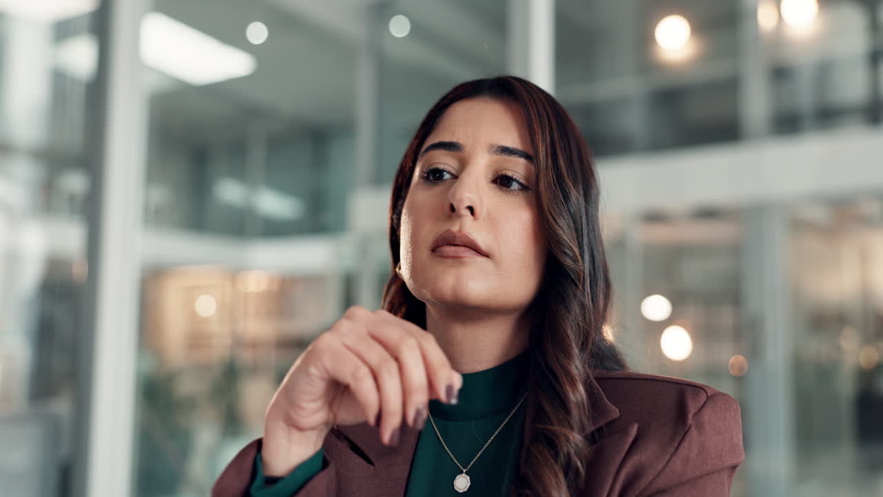 Portrait of a Thoughtful Businesswoman in Office