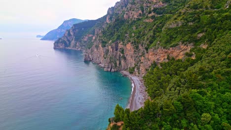 rocky cliffs towering at the amalfi coast in the amalfi, province of salerno, italy