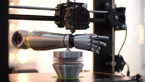 An Advanced Robotic Arm Delicately Manipulating a 3D Printed Object on a State-of-the-Art Machine in a Futuristic Workshop Environment