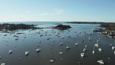 aerial high fly over drone footage over ocean of maine coast at vinalhaven, fox islands, knox county maine, usa