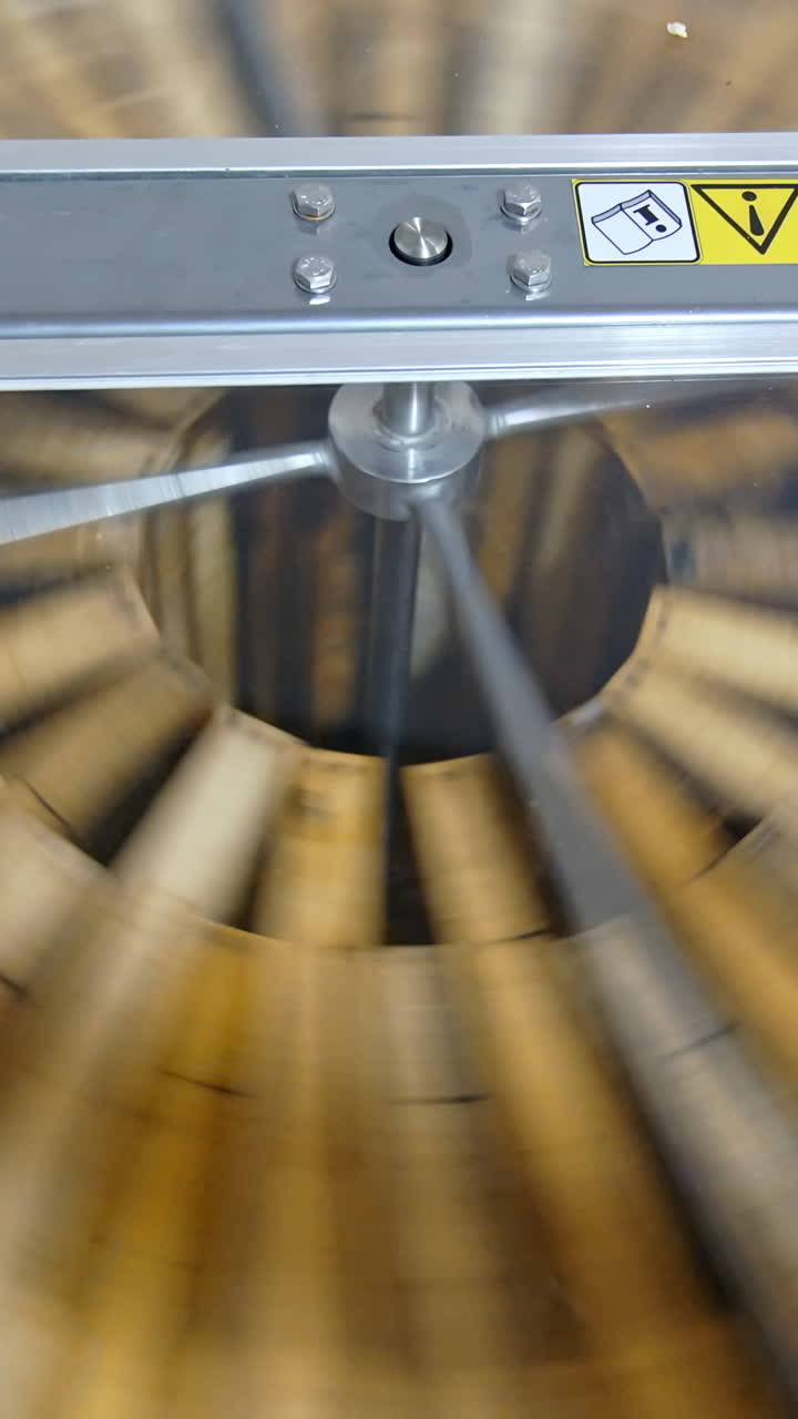 Removal of honey from honeycomb