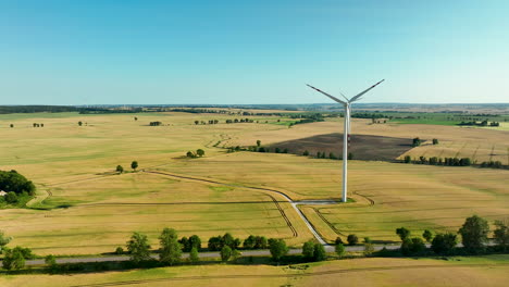wind turbines in rural agricultural fields on a sunny day
