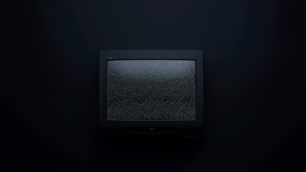Middle sequence of vintage CRT monitor idle on dark studio background with subtle rim lighting