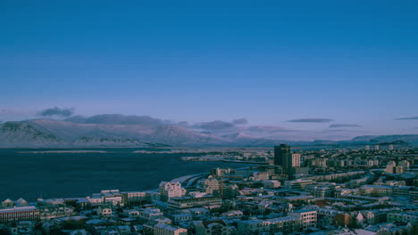 timelapse, wide aerial view over snowy reykjavik iceland