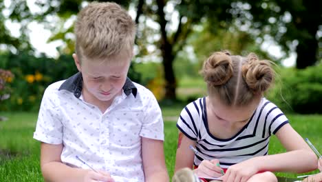group of cheerful children learning outdoors at school after quarantine lockdown
