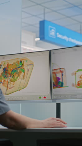 airport security checkpoint with x-ray luggage scan