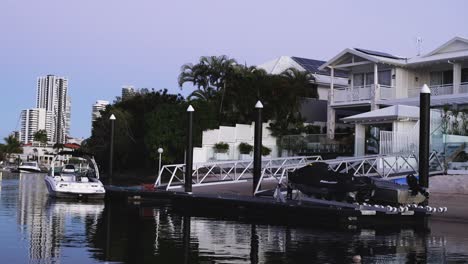 a boat travels through a picturesque urban river setting.