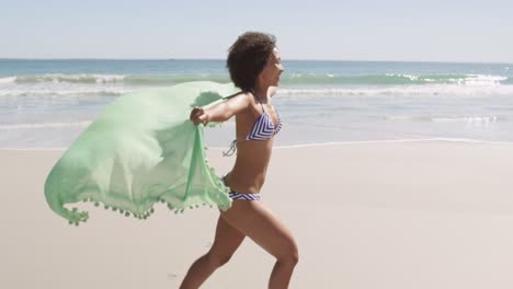 young woman running at the beach 4k