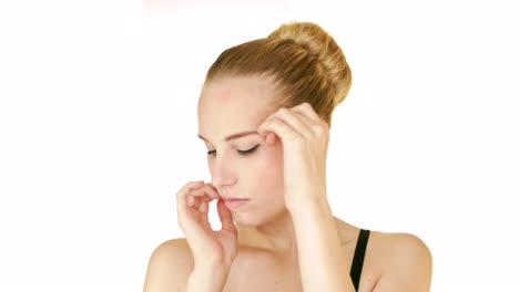 portrait of beautiful sexy woman touching her face gently
