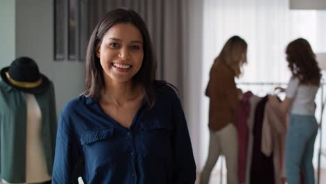 Portrait-of-mixed-race-woman-in-workshop.