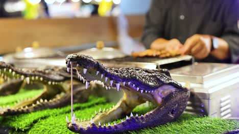 crocodile display at ao nang night market