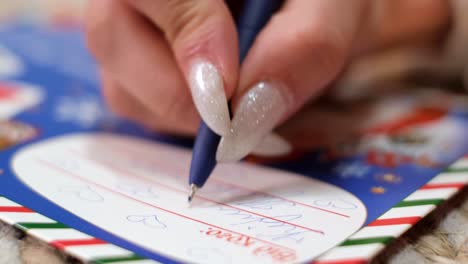 young mother with children she is having fun and writing a letter to santa claus young mother with children she is having fun and writing a letter to santa claus happy smiling family