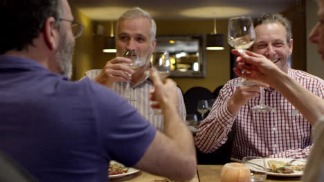 Mature-Friends-Eating-Meal-In-Boutique-Hotel-Shot-On-R3D