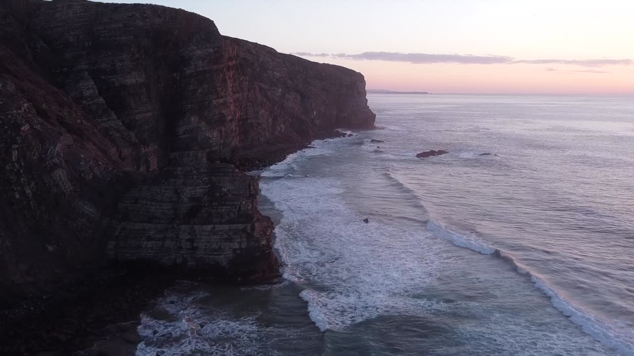 Aerial Serenity: Raw Drone Footage Capturing a Wild Beach at Sunset