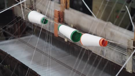 industrial loom with bobbins