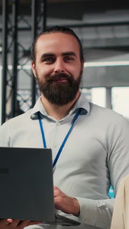 vertical video portrait of diverse business associates analyzing data insights