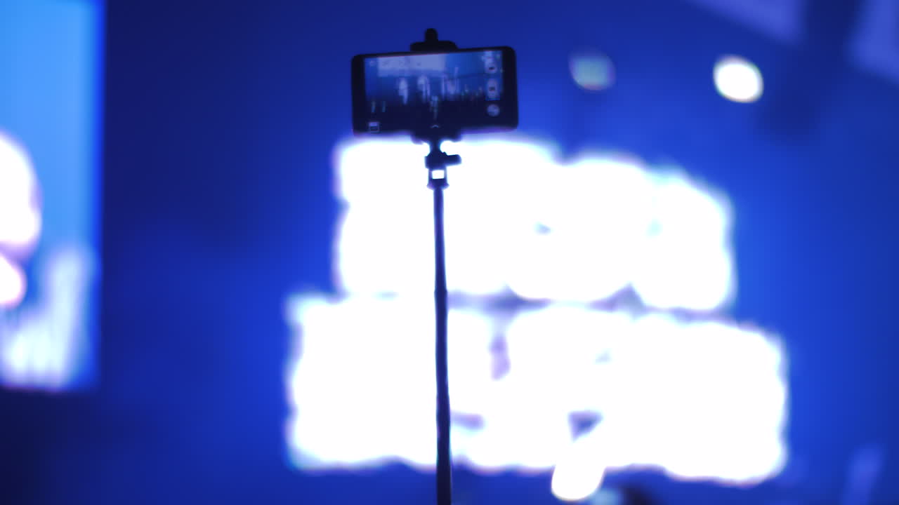 concierto de disparos con teléfono móvil