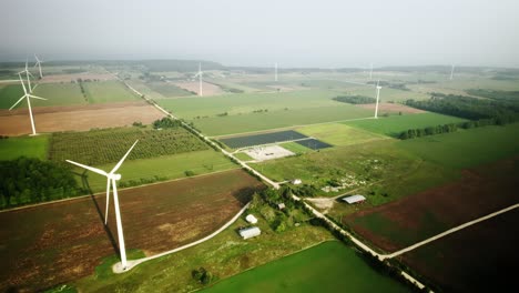 drone footage of a wind turbine generating energy from wind