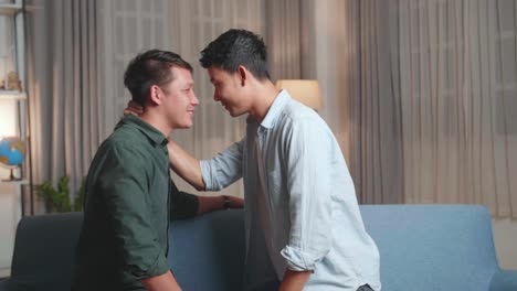 handsome young asian adult gay couple spend time at home. two happy men in love in casual clothes make a gentle headbutt. cute lgbt relationship content