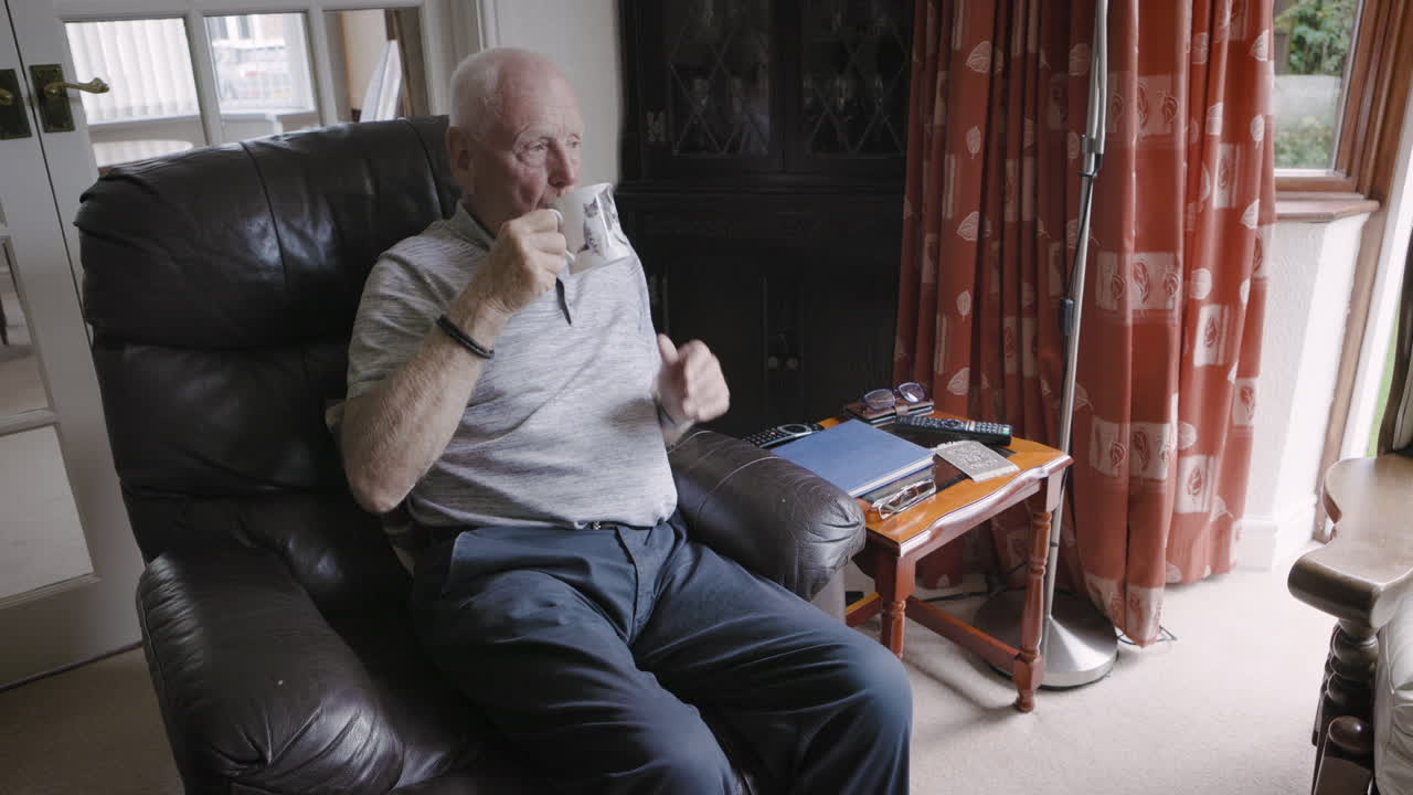 A senior man relaxing indoors
