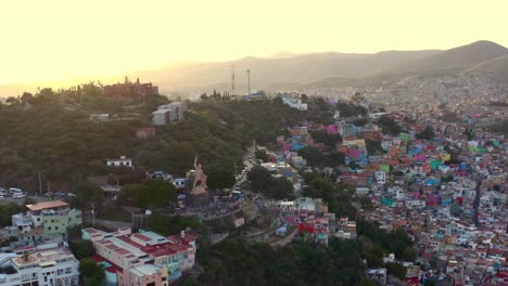 AERIAL:-Guanajuato-City-and-The-Pipila,-Mexico