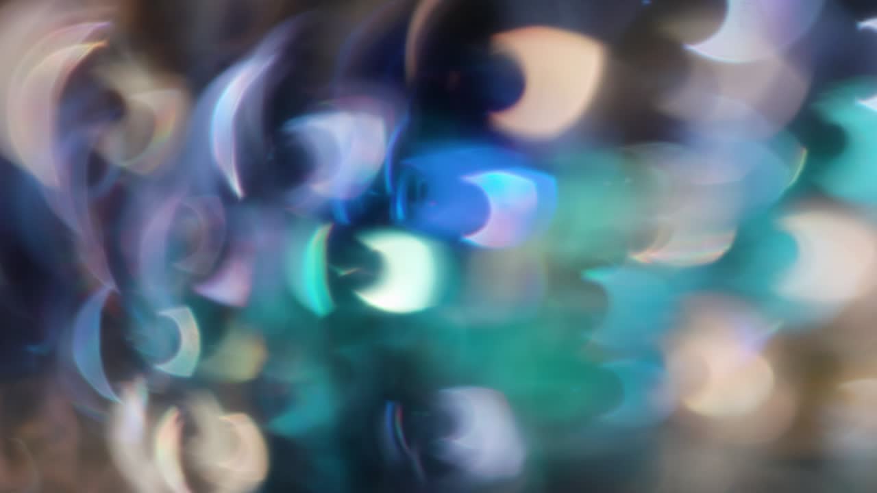 la rotación de los círculos bokeh en el sentido de las agujas del reloj