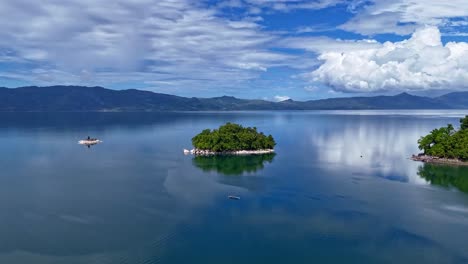 aerial hyperlapse of lake mainit with island