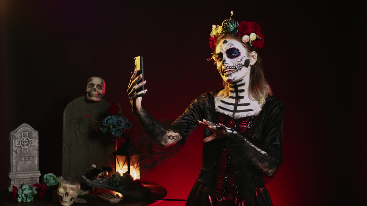 Woman with Day of the Dead Makeup Taking a Selfie