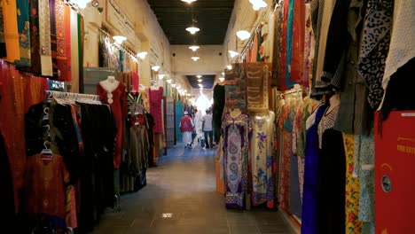 workers and shopping stands in middle east souk market