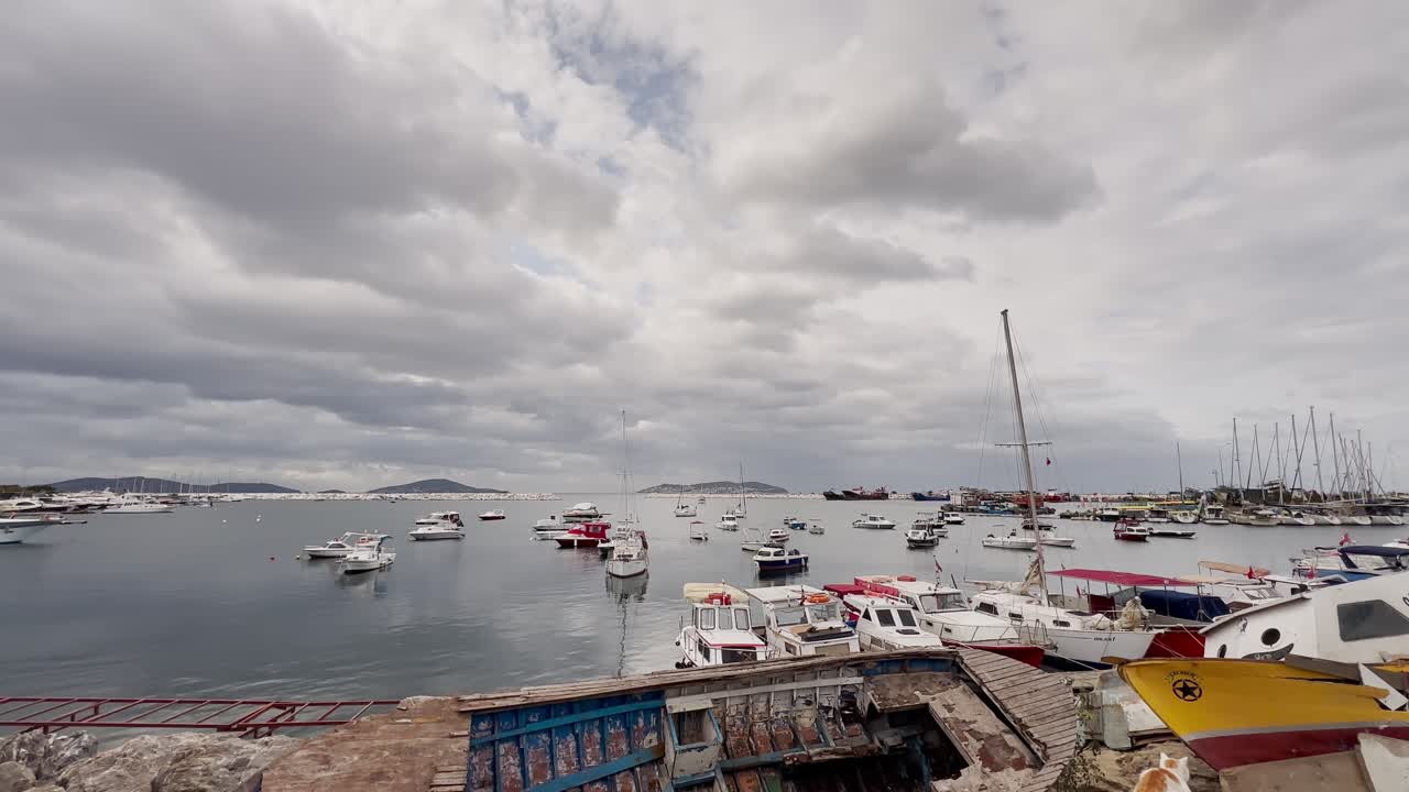 Cloudy Day at the Harbor: Many Boats and Calm Waters